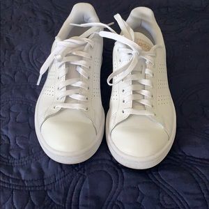 Adidas white sneakers with gold detail